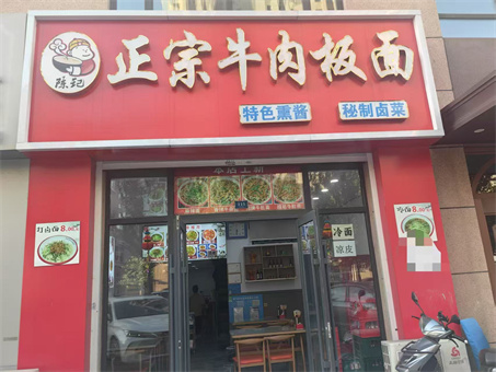 ţ